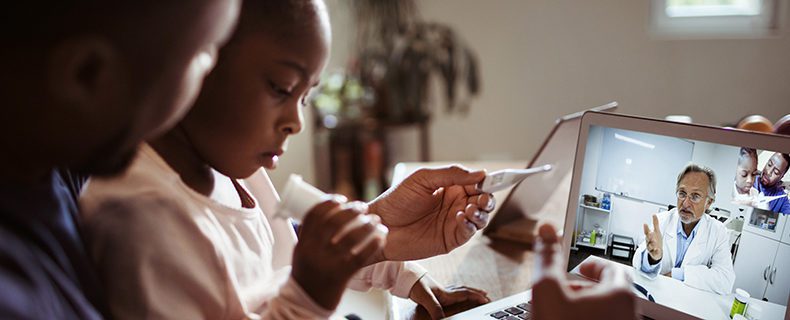 Parent and child converse with doctor through telehealth app
