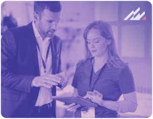 Clinician and nurse talking.