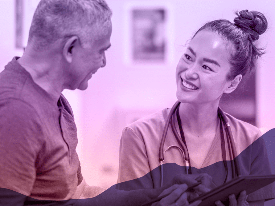 Doctor talking to patient in hospital