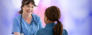 Nurse talking to patient i hospital