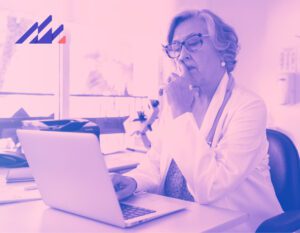 Doctor at computer using AI EHR software